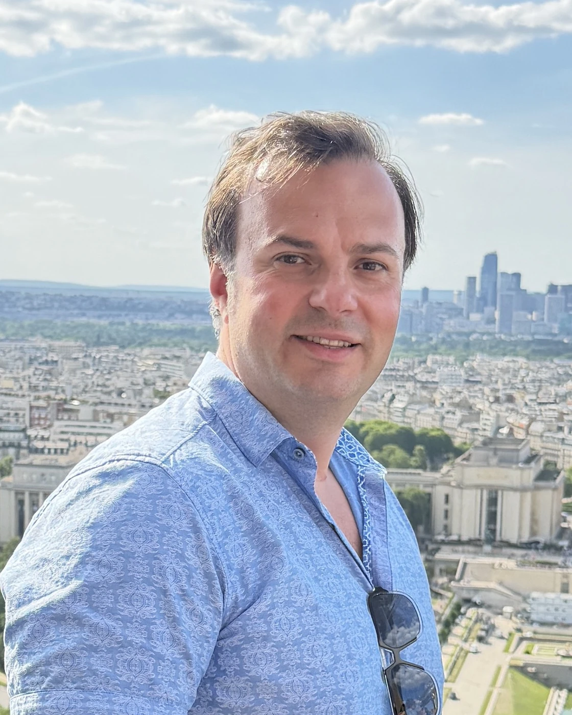 Danny Milea, founder of Auto Glass Marketing King, smiling outdoors